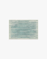 Striated Border Blue Rug
